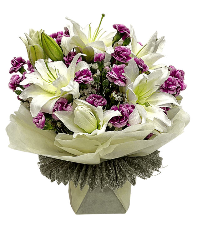 Purple shaded carnations white lilies