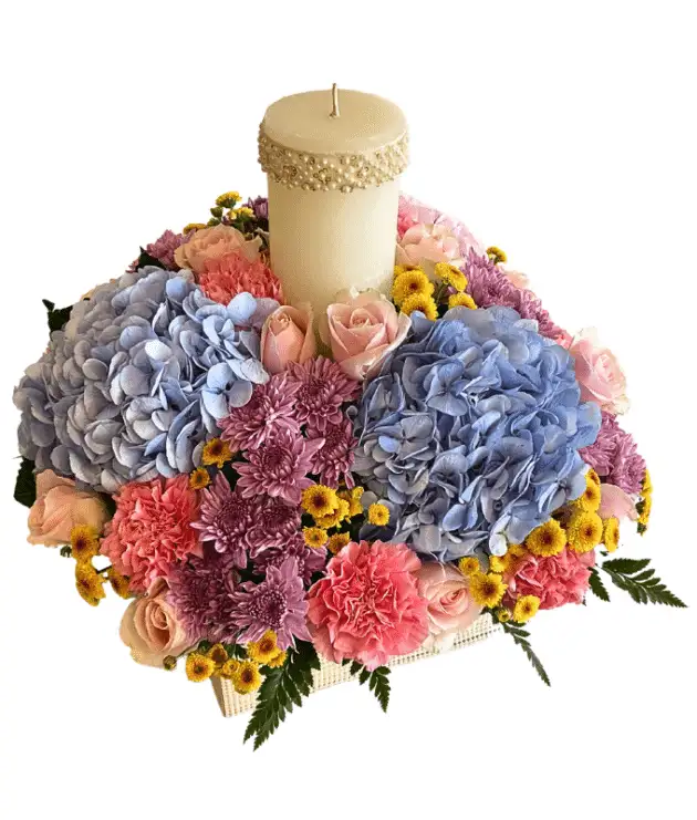Blue hydrangea,pink hydrangea,pink carnations,yellow button chrysanthemums,sweet pink roses,purple chrysanthemums with wax candle