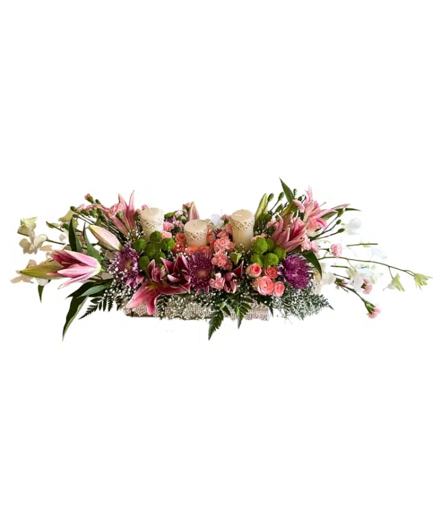 3 feet Long Dinning Table Arrangement with three wax candles White orchids,pink lilies,green button chrysanthemums,jumelia roses,pink spray carnations,purple chrysanthemums