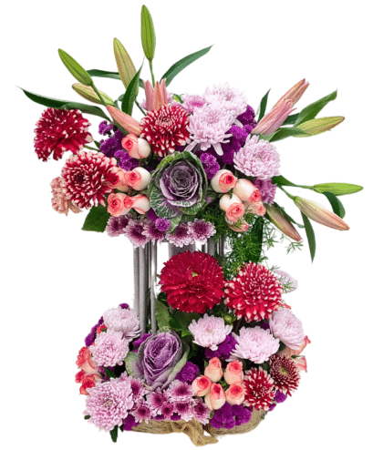 Red dalia,jumelia roses,purple chrsanthemums,pink disbuds,pink lilies,purple cabbage flower, two tier floral arrangement
