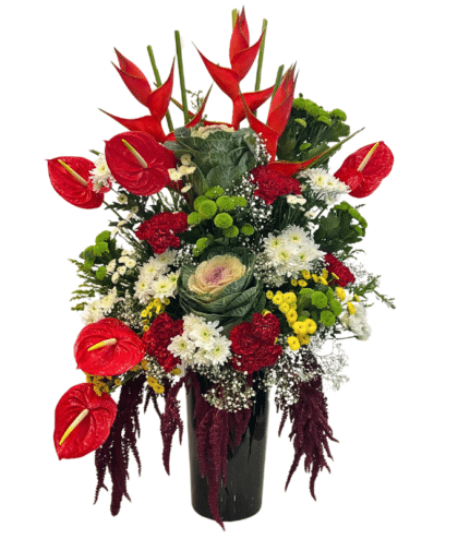 Red Anthorium,cabbage flower,green buttob chrysanthemums,red roses,red amaranthus,red carnations,yellow dotted chrysanthemums,white chrysanthemums,red bid bud arranged in long black vase