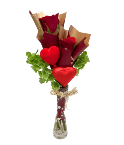 heart shaped chocolates with 2 red roses in glass vase